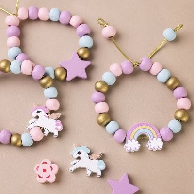 Elastic bracelet with wooden beads in pastel colours