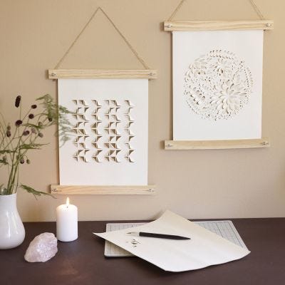 Paper art in poster hangers