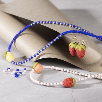Necklaces and earrings with fruit beads in jewellery clay