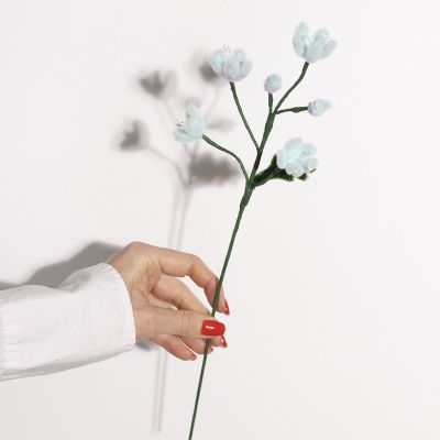 Cluster of mini pipe cleaner daisies