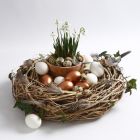 A natural Wreath decorated with Birds, Feathers and Eggs
