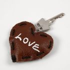 A Leather Heart with Text as a Key Fob
