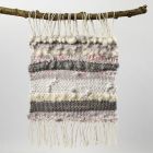 A woven Picture from Cotton Yarn, Wool and Strips of Fabric