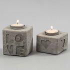 Cast Candle Holders with Letters and Shapes in Relief