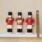 A Terracotta Nutcracker decorated with Plus Color
