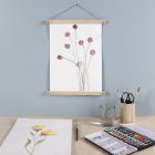 A purple Flower painted with Watercolours and hung with Poster Hangers