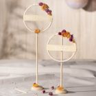 Table decorations from a bamboo ring decorated with dried flowers