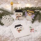 Snowflake, snowman, Christmas candles and angel, all made with BioBeads