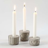 Cast Candle Holders with Shapes in Relief