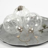 A Glass Bauble with Ice Dots made from transparent Glue