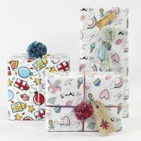 Gift wrapping with wrapping Paper, Yarn and Decorations