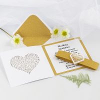 A Wedding Invitation with glitter Gold Design Paper and a heart-shaped Shaker Sticker