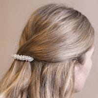 A Barrette decorated with Wax Bead Flowers