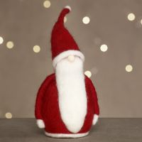 A Father Christmas needle felted on polystyrene