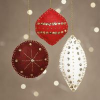 Felt Christmas decorations with beads and embroidery