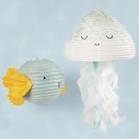 A jellyfish and a fish from a rice paper lamp decorated with craft paint and tissue paper
