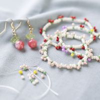 Bead bracelet and bead earrings with berries