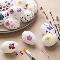 Eggs decorated with pressed and dried flowers