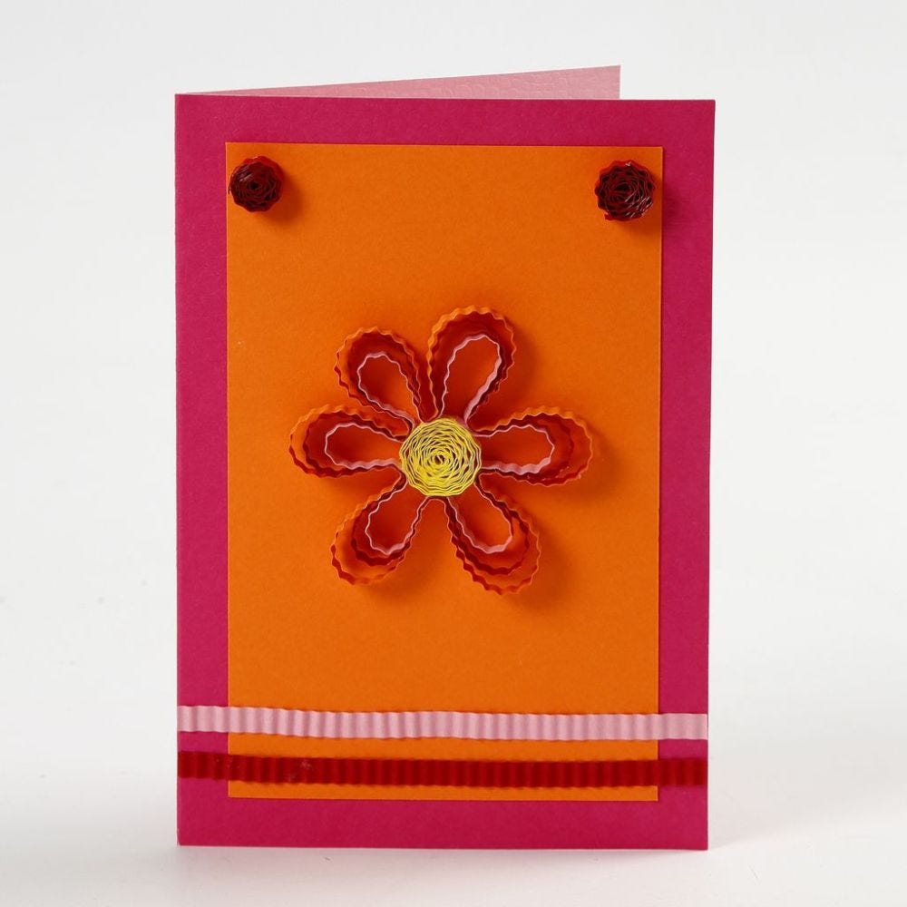 A Greeting Card with a Flower and decorative Paper Quilling
