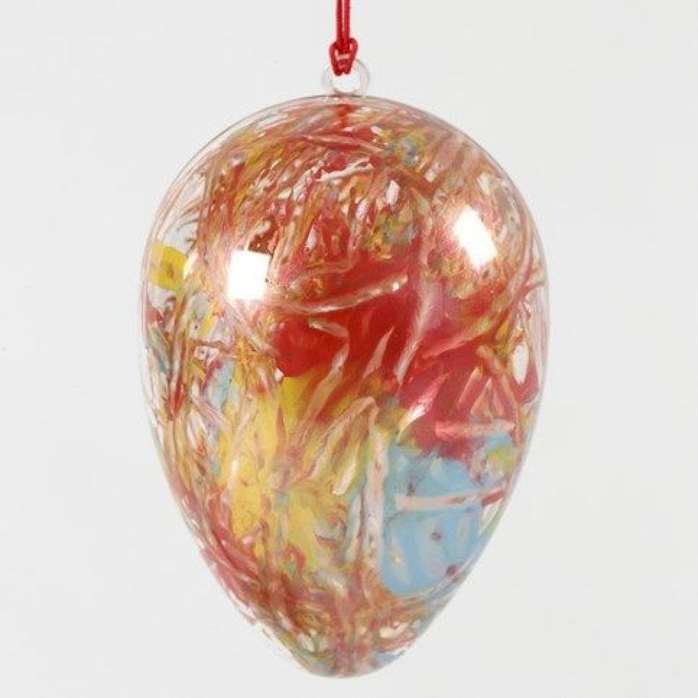 A two-part transparent acrylic Egg with an abstract Painting