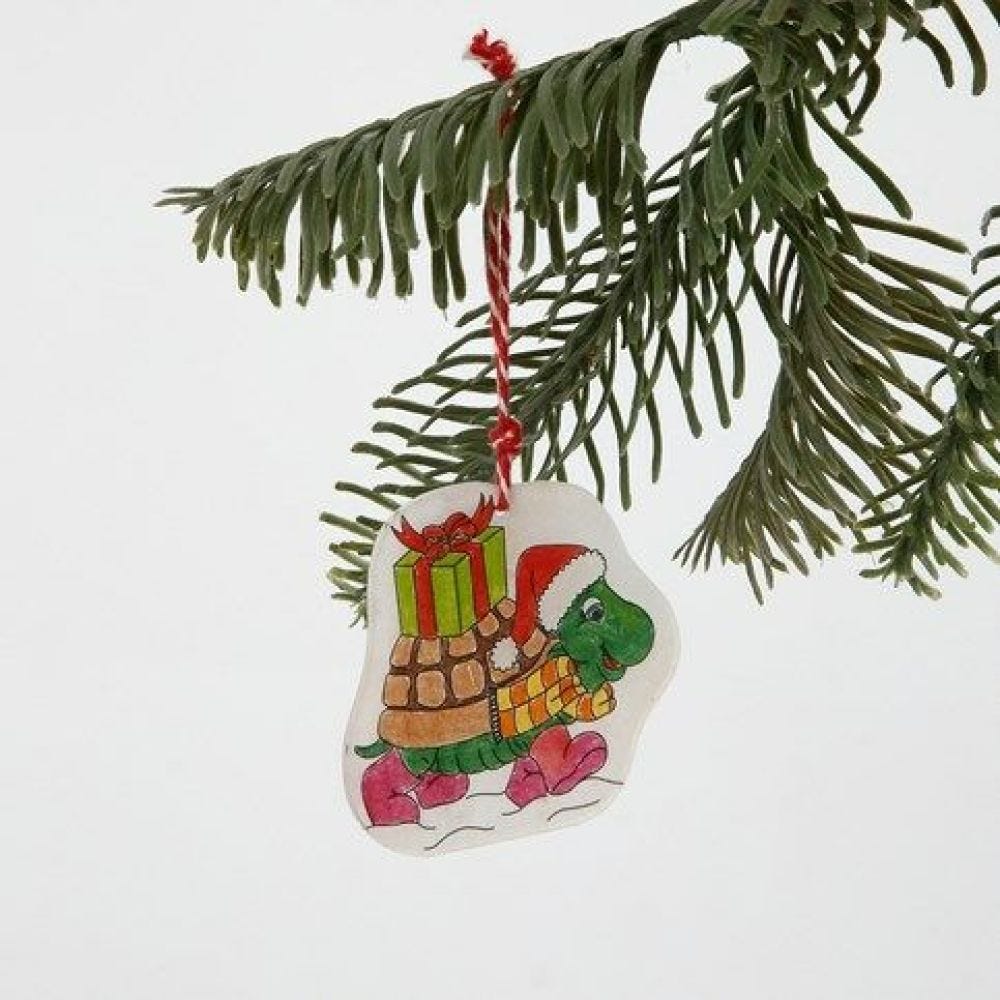 A Shrink Plastic Hanging Decoration with a Christmas Design