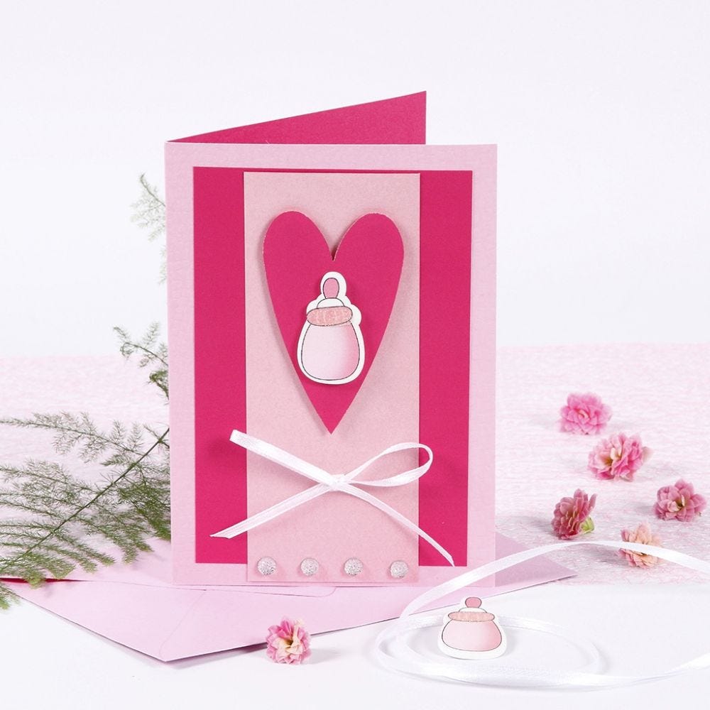 An Invitation with a Baby Bottle for a Christening