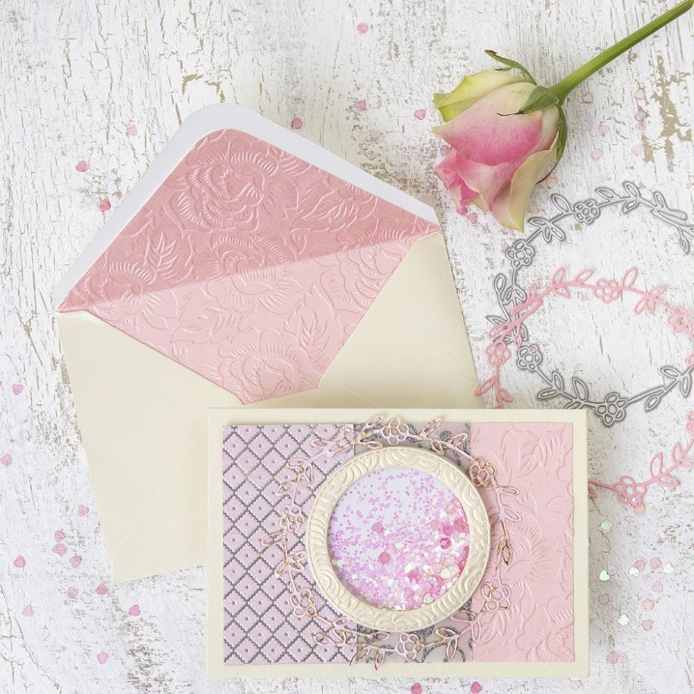 A Shaker Card with a Circle Design and matching Envelope from handmade Paper