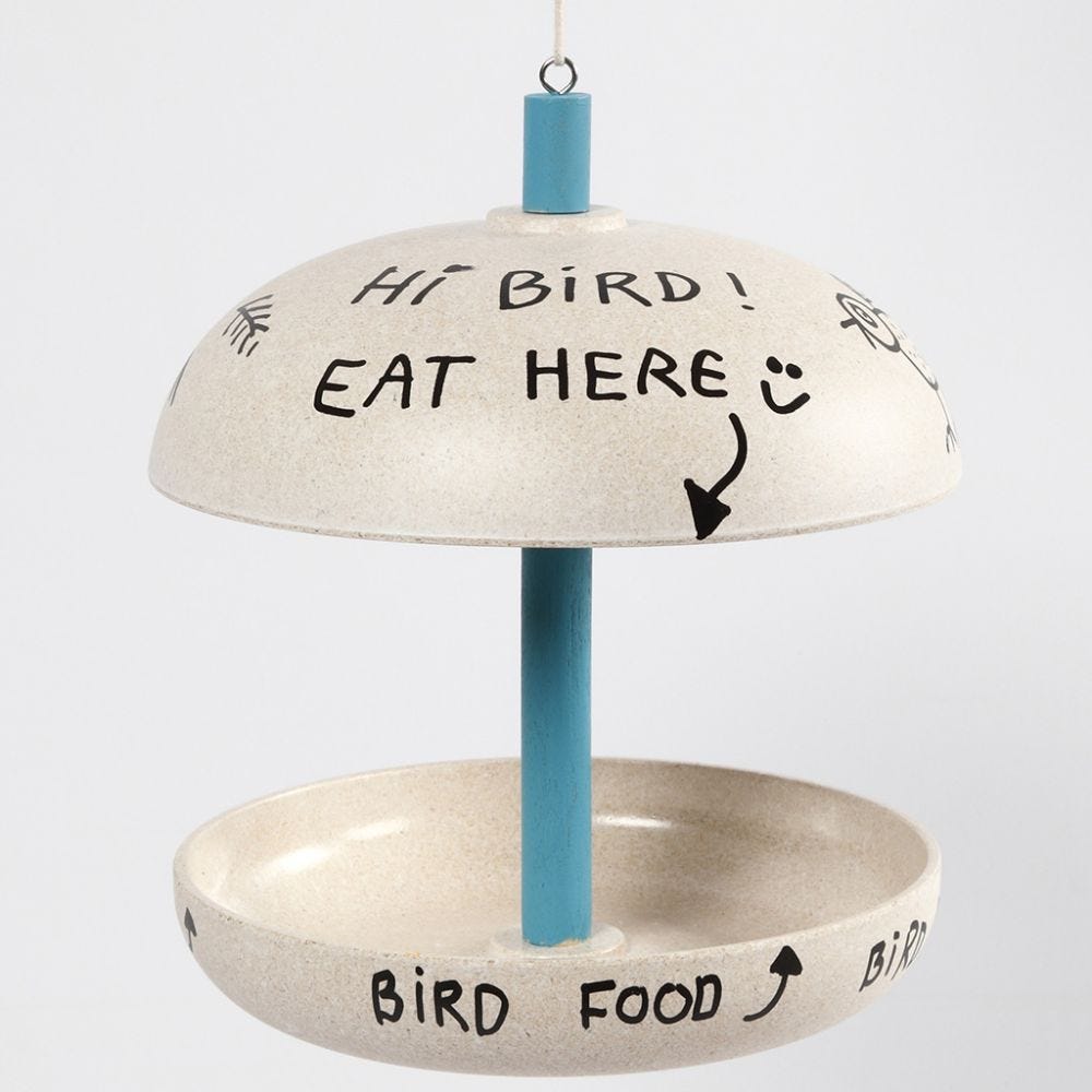 A bird table from bamboo fibres decorated with Plus Color craft paint
