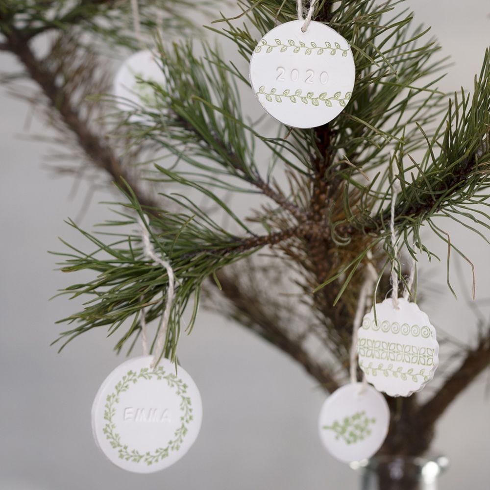 Hanging decorations made from self-hardening clay with stamped designs