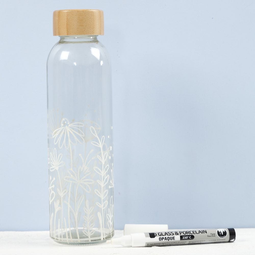 A water bottle decorated with glass & porcelain markers