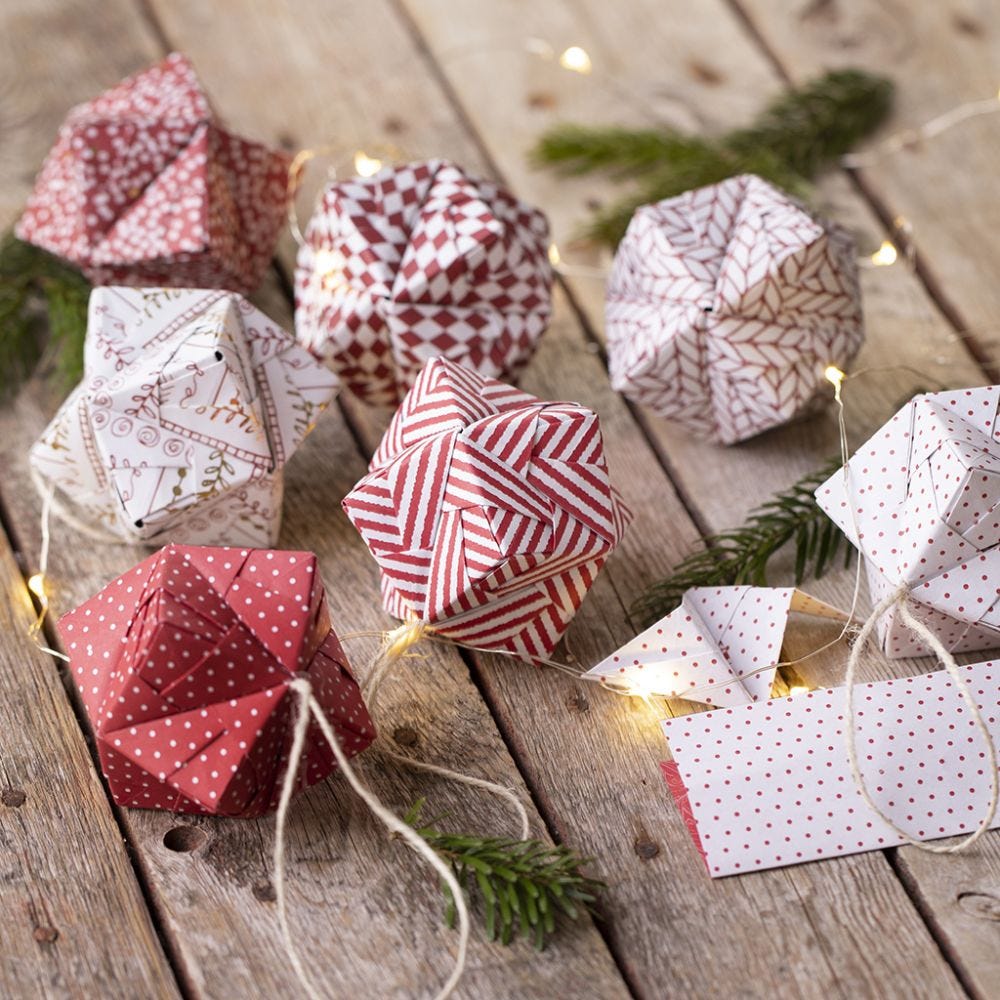 An origami Christmas bauble folded from origami paper