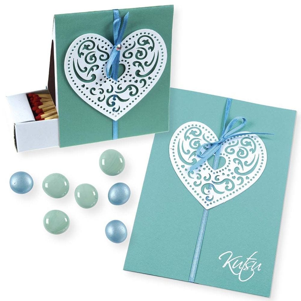 An Invitation and Box with Filigree Paper Hearts