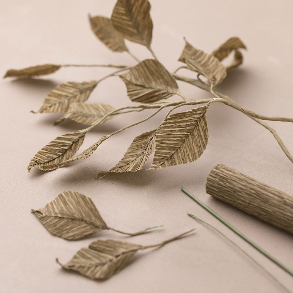 Branch with leaves in crepe paper