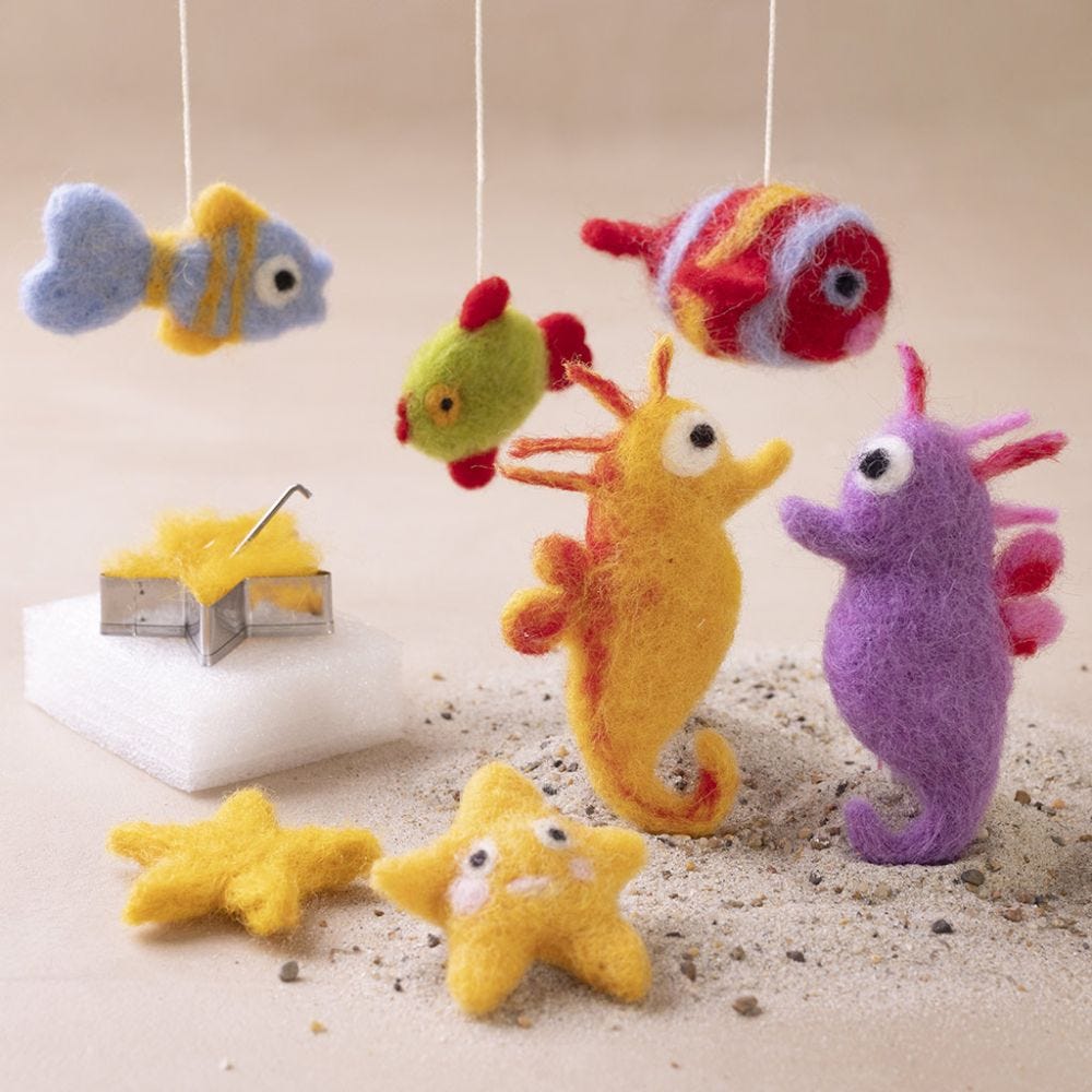 Needle felt figures as hanging decorations