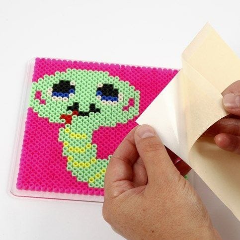 A Design made from Nabbi Fuse Beads on an adhesive Sheet DIY guide