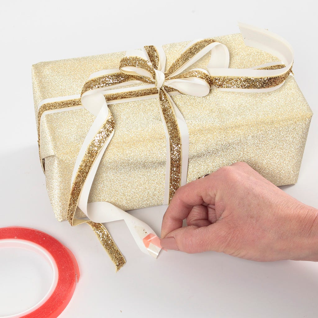 Gold Christmas Gift Wrapping decorated with Glitter Decorations