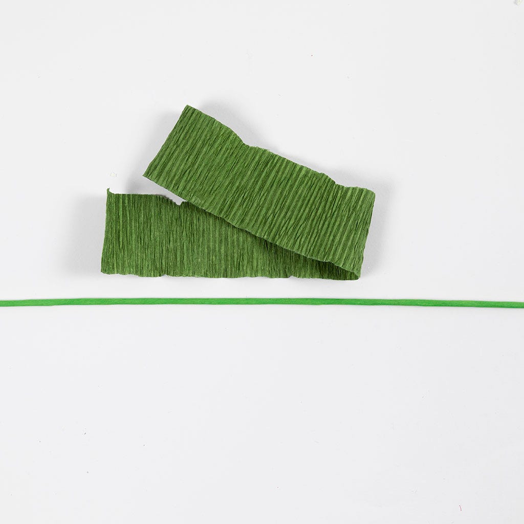 Gifts with green crepe paper wreaths